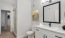 a bathroom with a white vanity